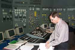 A test operator from South Ukraine NPP checks through the final site acceptance test procedure for the Unit 3 full-scope simulator.
